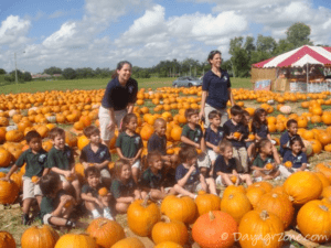 Kids at a pumpkin patch