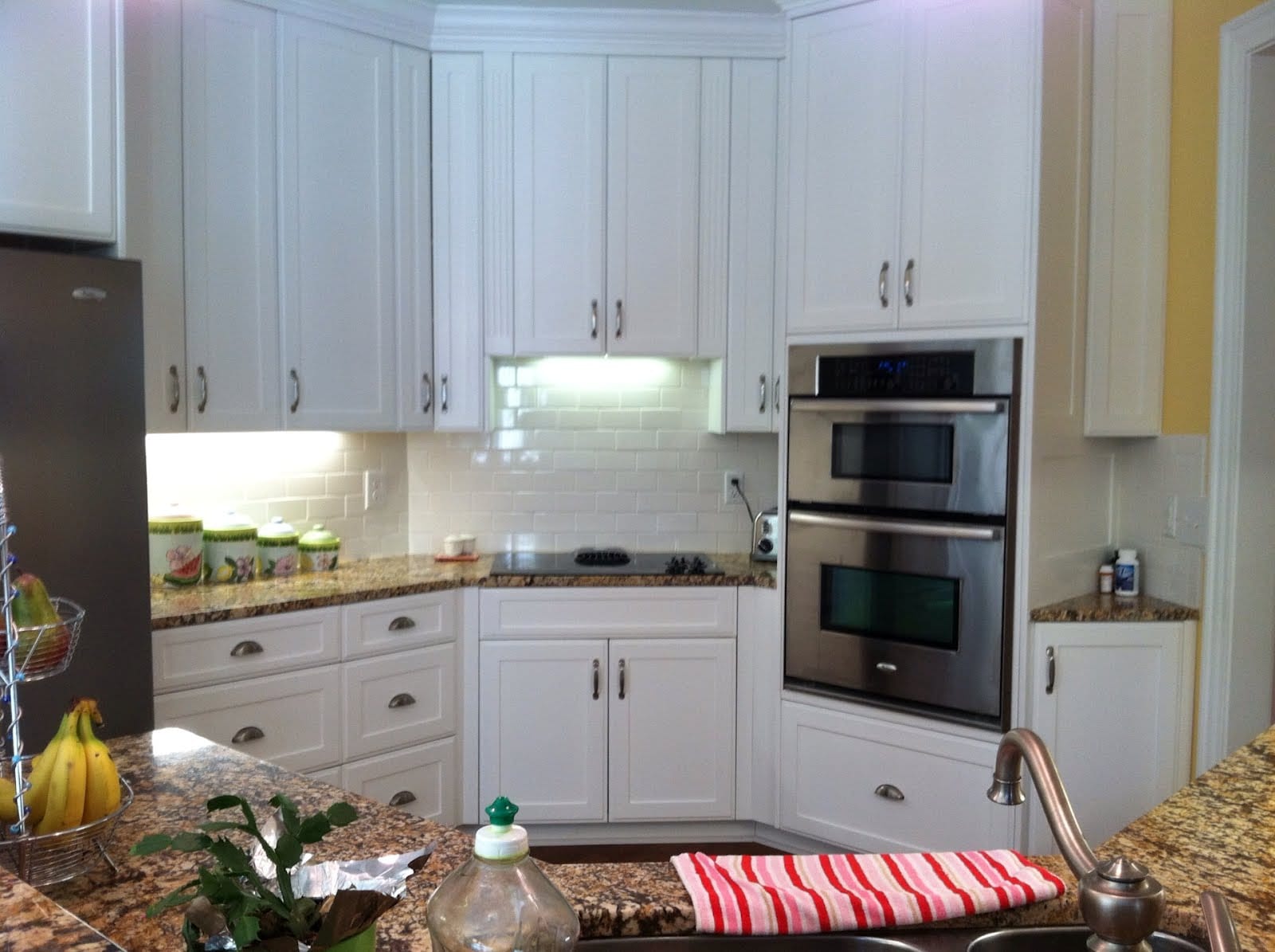 White Cabinets and Stainless Steel Kitchen