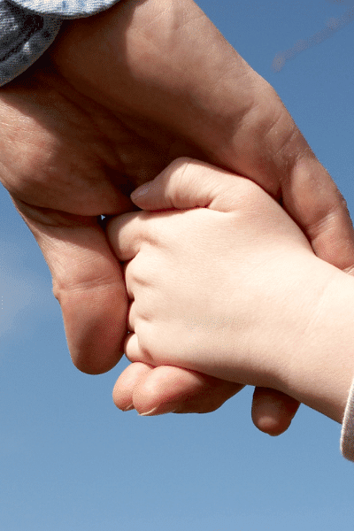 daddy and daughter holding hands