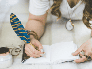 woman writing in her journal