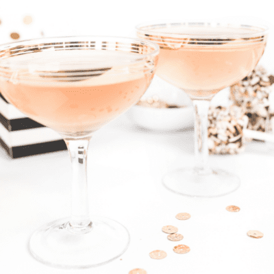 Two champagne glasses set for the Motivational Monday Series – ‘Tis the Season to Sparkle