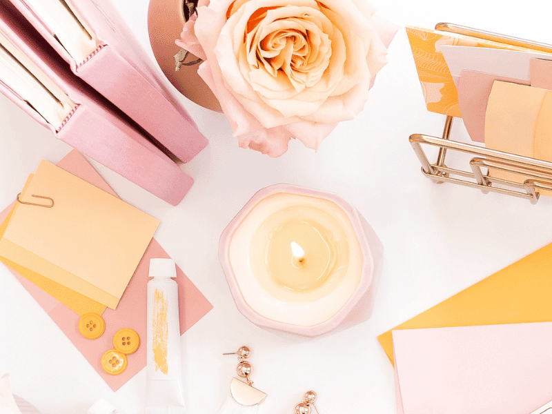 Beautiful desk with pink and yellow items 