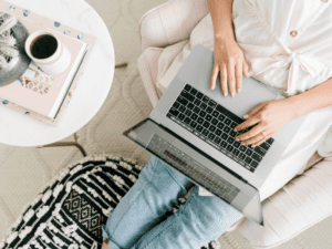 woman trying on a computer in her home office,