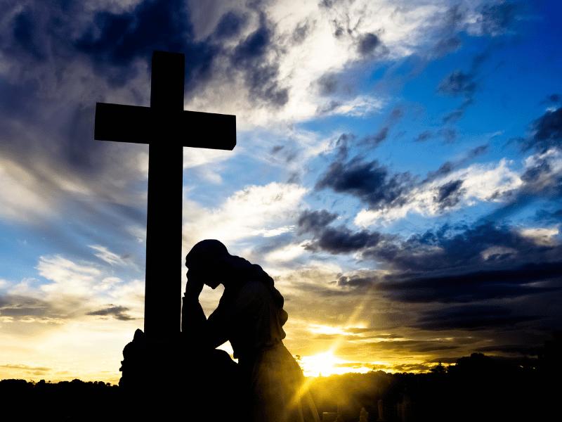 Memorial Weekend Church Service Honoring our Service Members, Service member prays at the cross, Finishing in Faith