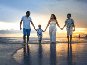 a family walks on the beach in Emerald Isle NC