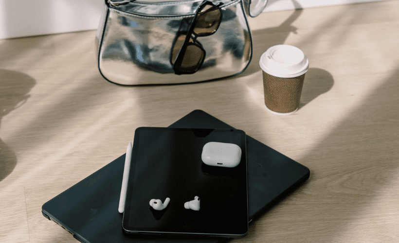 Purse coffee and digital devices for boss babes