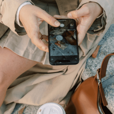 woman taking a photo to use for social media